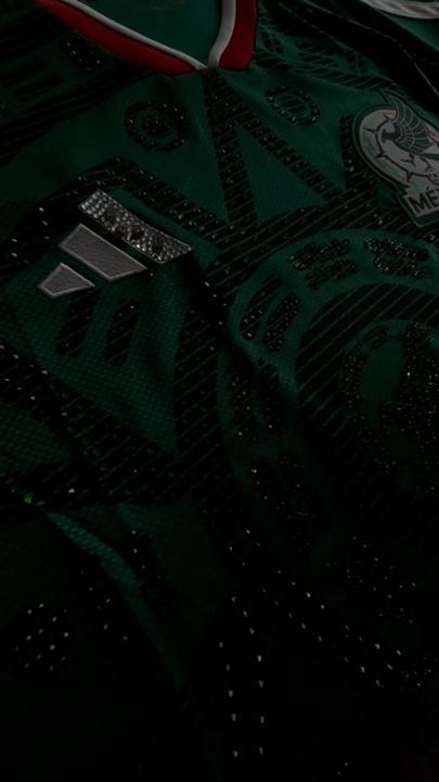 Close-up detail of hand-set rhinestones on a custom jersey, showing intricate stone-by-stone placement